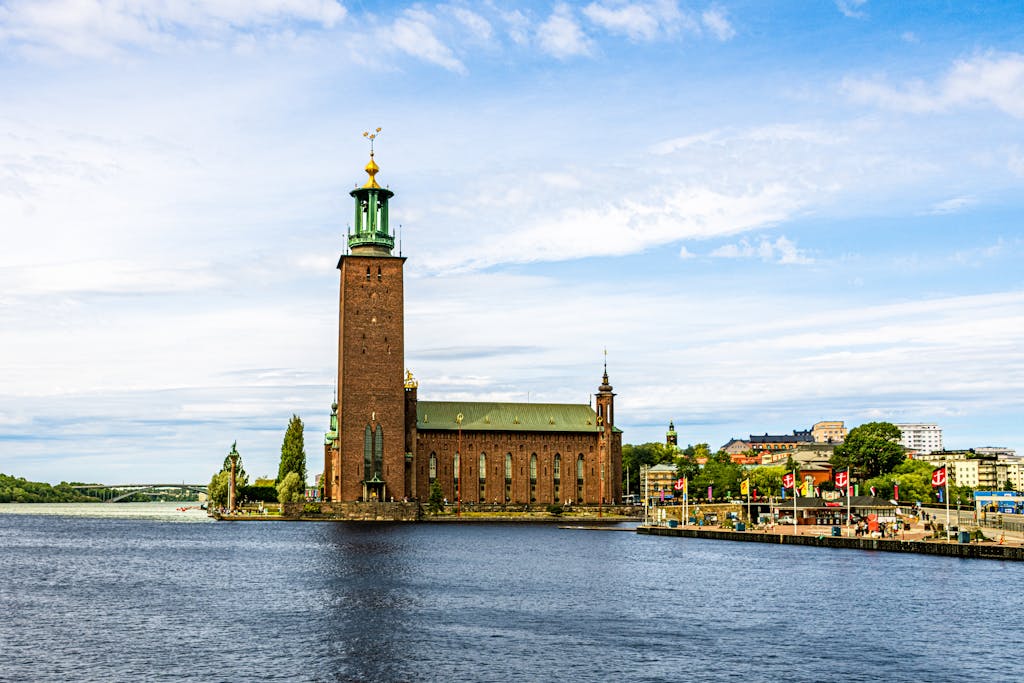 View of the iconic Stockholm City Hall with waterfront in Stockholm, Sweden.